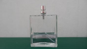 front view of clear perfume bottle photo