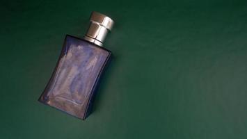 photo of a purple perfume bottle