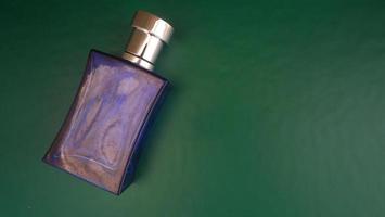 photo of a purple perfume bottle