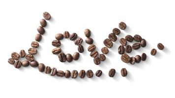 Signo de amor con granos de café dispuestos sobre fondo blanco. foto