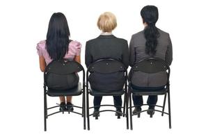 Back of three women at presentation photo