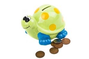 Money box and coins photo