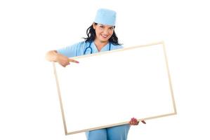 Doctor with banner point to copyspace photo