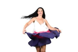 Beauty woman spinning her dress photo