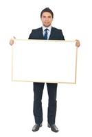 Businessman holding blank banner photo