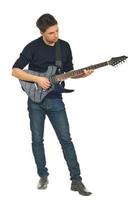 Full length of young man with guitar photo