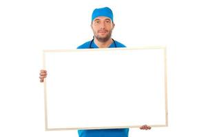 Surgeon man holding blank banner photo