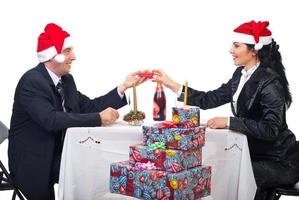 Happy elegant couple celebrate Christmas night photo