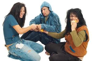 Beggars sharing a bread photo