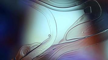 Abstract Colorful Food Oil Drops Bubbles and spheres Flowing on Water Surface, macro Videography video