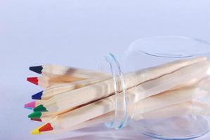 colored pencils in a glass jar photo