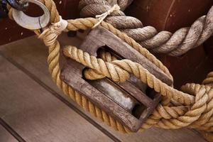 Hessian rope and wooden pulley photo