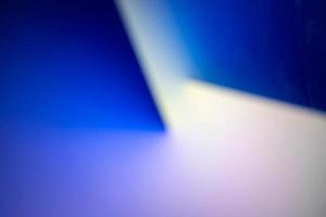 Defocus blurred image of blue and white abstract background. photo