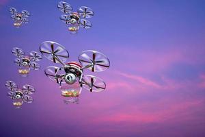 grupo de entrega de drones entrega un paquete de supermercado de carrito de paquetes en el cielo. foto
