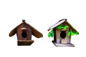 Mini home made from wooden on white background. photo