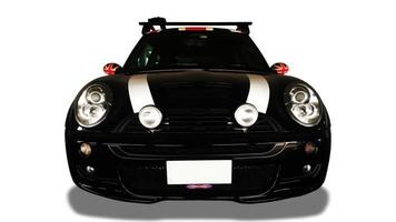 Front view of black car on white background.