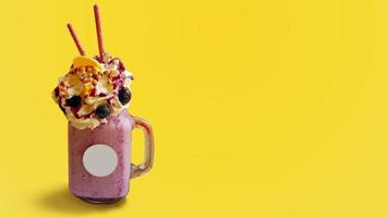 Close-up whip cream topping Blueberry Smoothie Drink on yellow background. photo