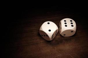 Dices on a wooden surface. 3d render photo