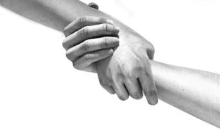 Black and white image of the hands of two people at the time of rescue 3d illustration