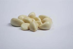 a collection of kitchen spices called garlic on a white background