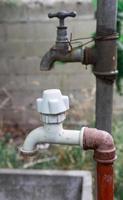 New and old water faucets