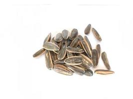 Kuwaci seeds on a white background, photo