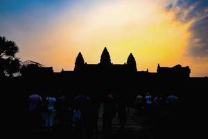 silhouette ankor wat in the dark with beautiful sunrise sky photo