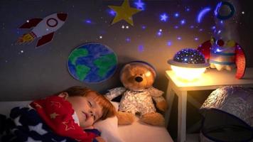 Child sleeping in his room with lamp lights on video