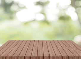 wooden table space for product Abstract natural bokeh sunlight background tree stock photo