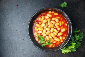 beans tomato sauce bean dish meal food snack on the table copy space