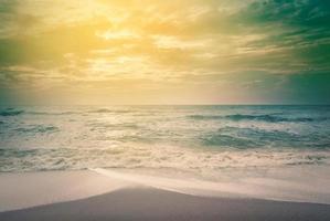 Landscape of tropical beach nature with coconut tree and clouds on horizon in Thailand. Summer relax outdoor concept. - vintage color filter photo