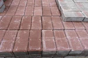 Red concrete paving slabs close-up photo