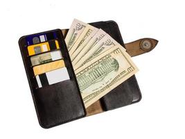leather wallet with money and cards on white background photo