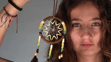 Young girl and dreamcatcher