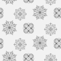 Seamless pattern with geometric and floral ornaments on the white background. Vintage pattern in Indian style. Vector illustration ideal for textile, wrapping, decorative paper, scrapbooking.