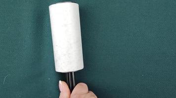Sticky Sticky Roller. Household cleaning tool for getting rid of dander, hair, debris, pet hair and down. video
