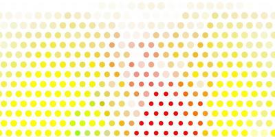 Light red, yellow vector backdrop with dots.