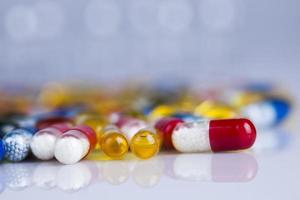 Composition with variety of drug pills background photo