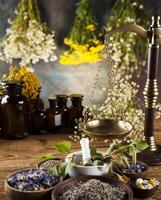 Medicine bottles and herbs background photo