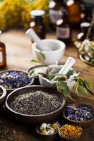 Herbal medicine on wooden desk background photo