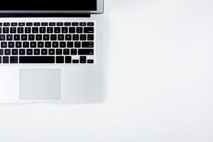 Top view of laptop computer with open display screen monitor isolated on white background, notebook or netbook with keyboard, communication technology concept. photo