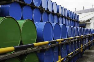 Oil barrels blue and green or chemical drums horizontal photo
