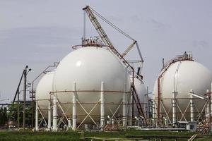 White spherical propane tanks containing fuel gas pipeline photo