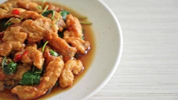 stir-fried fried fish with basil and chili in thai style - Asian food style