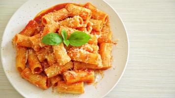 Rigatoni pasta with tomato sauce and cheese - traditional Italian pasta video