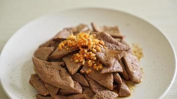 homemade stir-fried pork liver with garlic on plate video