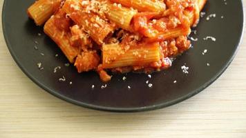 Bolognese rigatoni pasta with cheese - traditional Italian pasta video