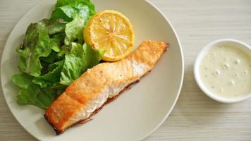 homemade fried salmon steak with lemon and vegetable - healthy food style video