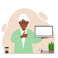 A grandmother holds a laptop computer on his hand and shows a thumbs up sign. Laptop computer technology concept. Vector flat illustration.