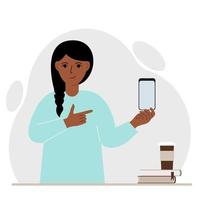 A happy woman holds a mobile phone in one hand and points at it with the index finger of his other hand. Vector flat illustration